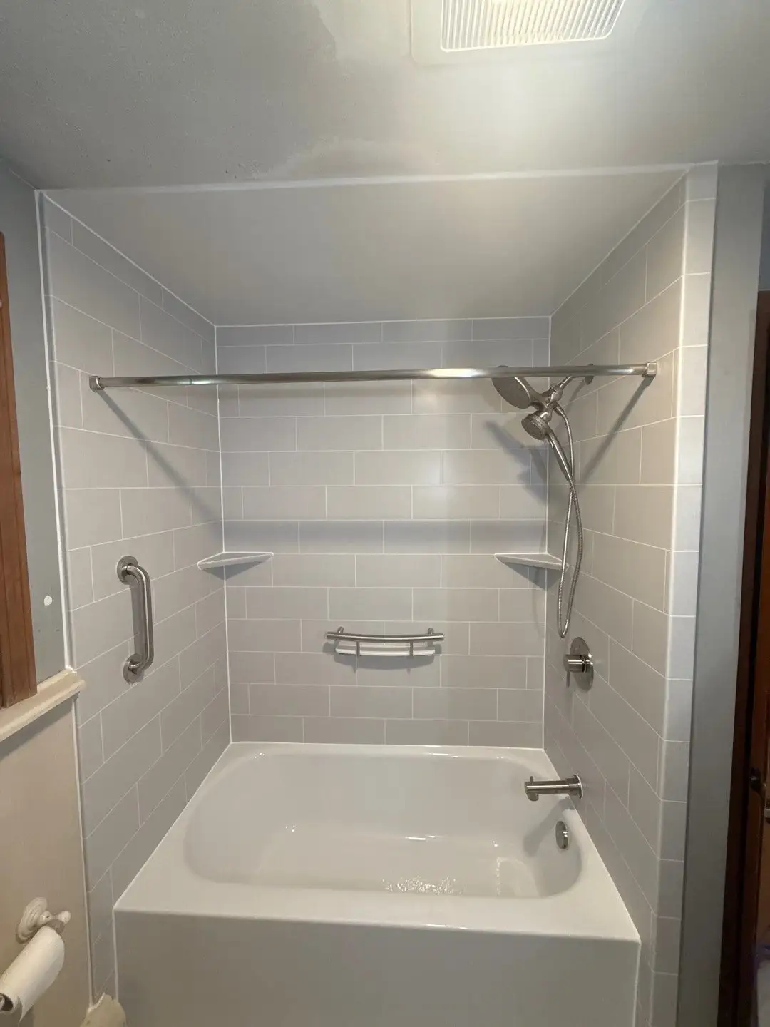 Classic tub replacement with laser-etched tile surround in South Easton, MA